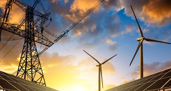 Renewable energy infrastructure with solar panels, wind turbines and power lines